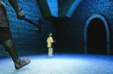 Knightmare Series 8 Team 4. A huge troll strides in as Michael reaches the corner of a blue chamber.
